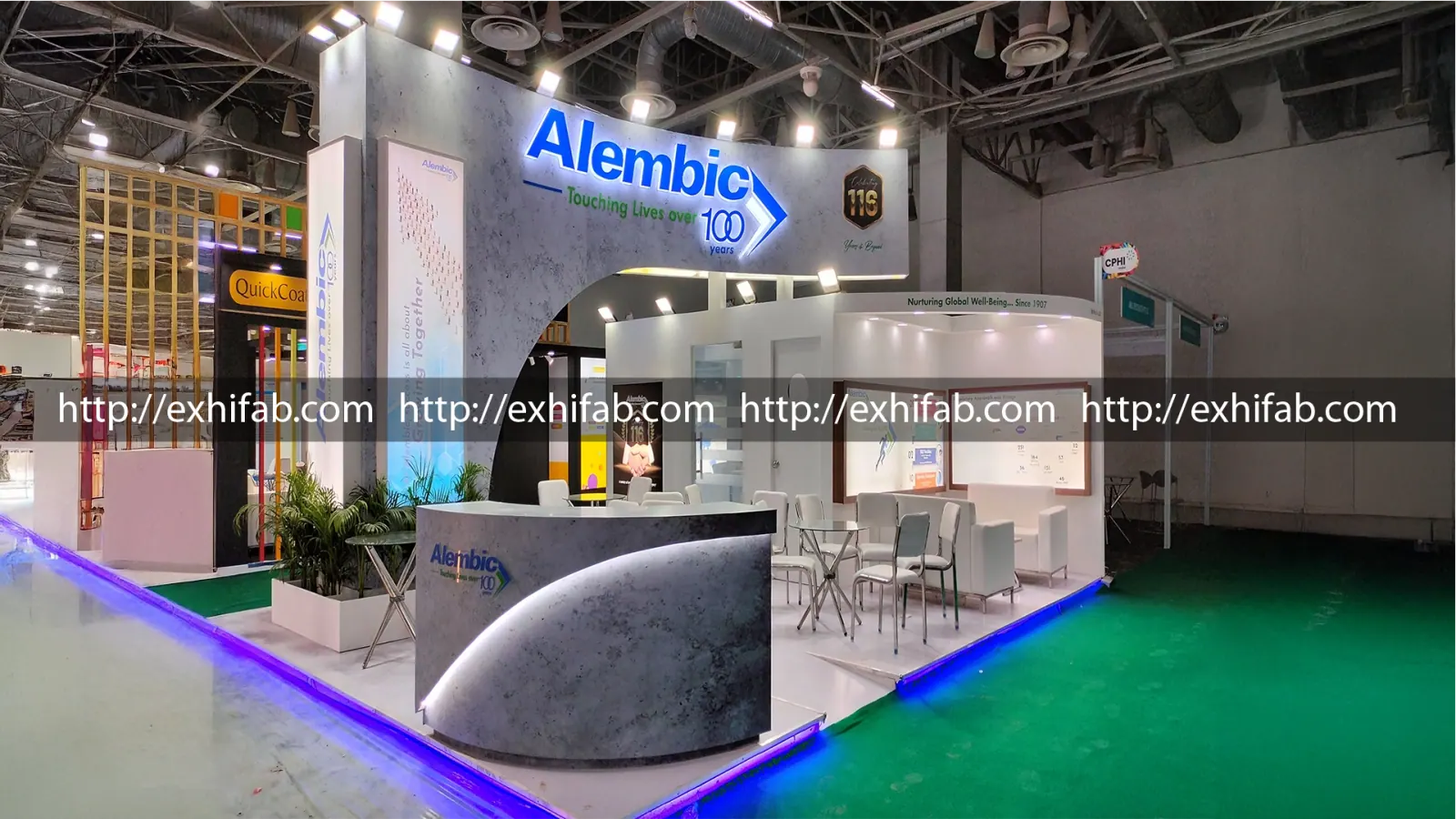 Alembic Pharmaceuticals exhibition stall with an arched stone-textured entrance, illuminated logo and glossy floor at CPHI India